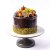 3. Torta s čokoládovou glazúrou s pistáciami a ovocím