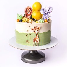 35. Dvojfarebná torta so zvieratkami a snehovými pusinkami